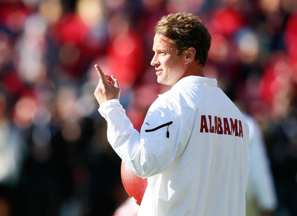 Alabama Offensive Coordinator Lane Kiffin works out during pregame warm-ups before a game against Mississippi State on Nov. 15.