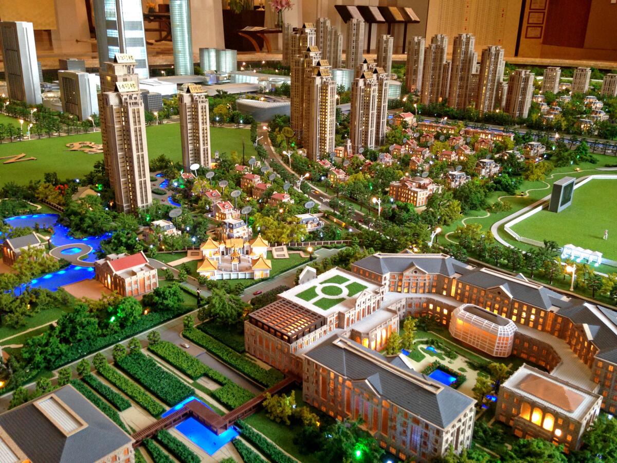 A model of the Tianjin Goldin Metropolitan development includes a hotel, in the foreground, villas and a business district. "Our product, in one word, is lifestyle. We sell lifestyle," said Harvey Lee, a UC Berkeley graduate who is vice chairman of Goldin Real Estate Financial Holdings.