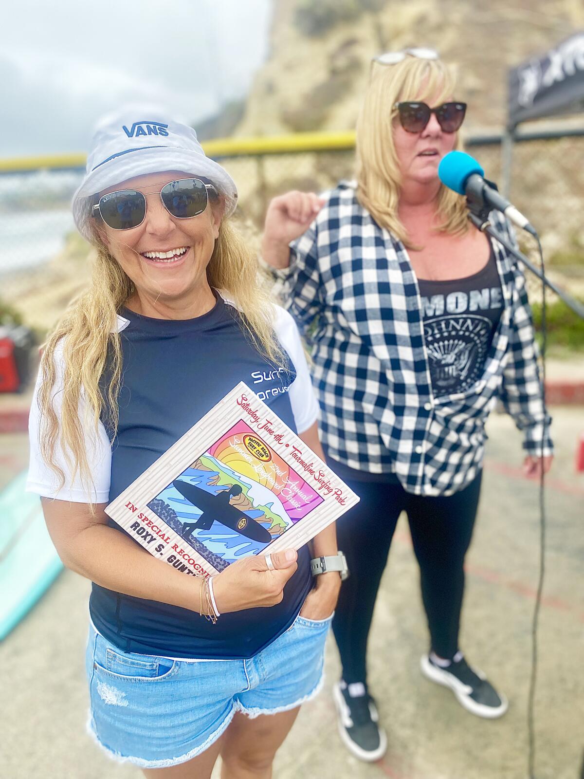 Roxy Gunther receiving recognition for her sponsorship efforts at the Tourmaline Longboard Classic.