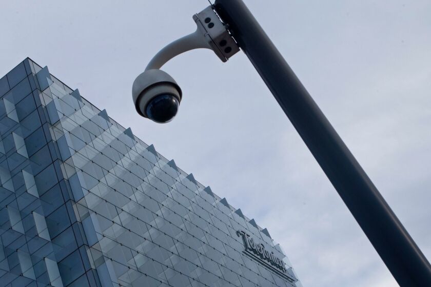 A security camera stands outside the main Telefonica headquarters in Madrid, Spain, Friday, May 12, 2017. The Spanish government said several companies including Telefonica had been targeted in ransomware cyberattack that affected the Windows operating system of employees' computers. It said the attacks were carried out with a version of WannaCry ransomware that encrypted files and prompted a demand for money transfers to free up the system. (AP Photo/Paul White)