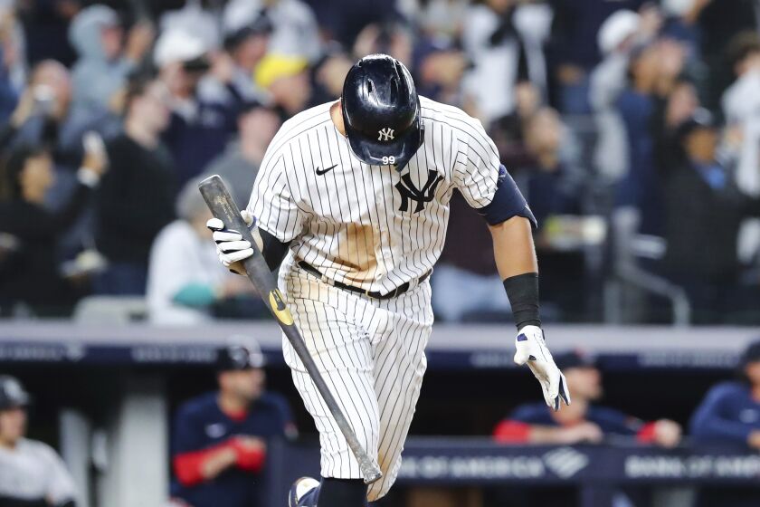New York Yankees designated hitter Aaron Judge reacts after flying out against Boston Red Sox starting pitcher Brayan Bello during the fifth inning of a baseball game Sunday, Sept. 25, 2022, in New York. (AP Photo/Jessie Alcheh)