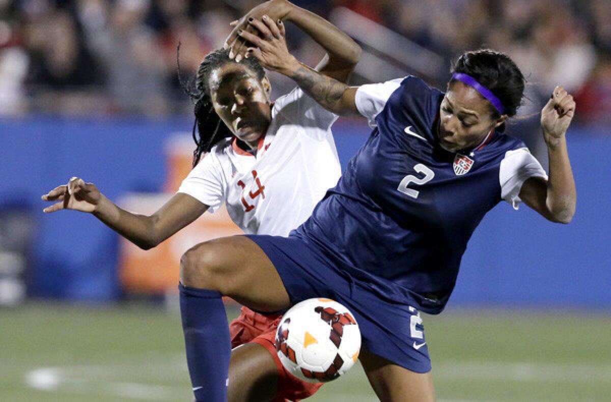 U.S. forward Sydney Leroux (2) and Canada defender Kadeisha Buchanan (14) vie for the ball during the first half of a soccer game on Friday in Frisco, Texas.