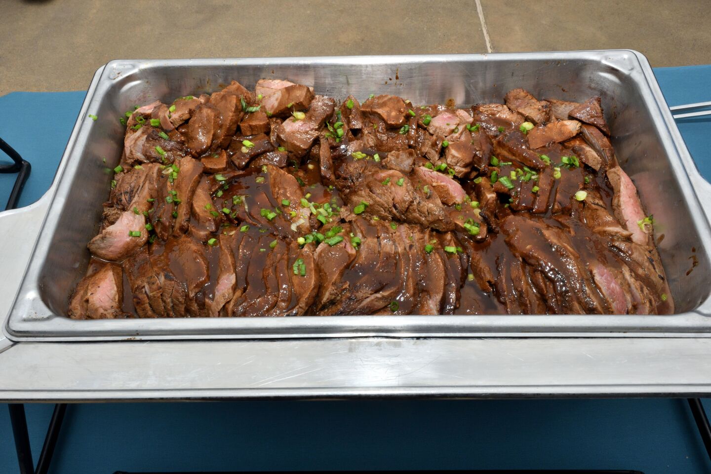 Hawaiian-style marinated beef was ready for luau guests to dig in.