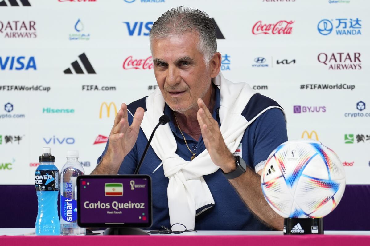 Iran coach Carlos Queiroz speaks during a news conference in Qatar on Monday.
