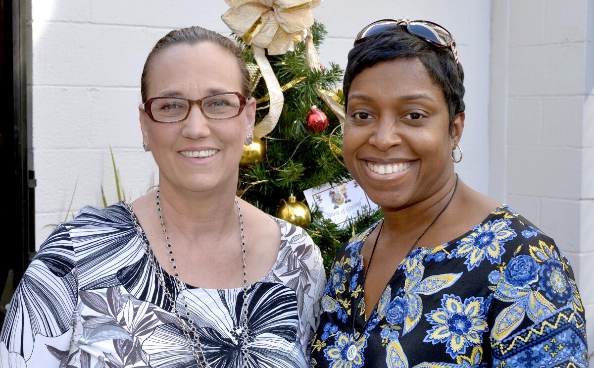 The local chapter of National Charity League, represented by Cynthia Wagner, left, and Robyn Ellis, was lauded as a 2019 Spirit of Giving honoree. (Photo by David Laurell)