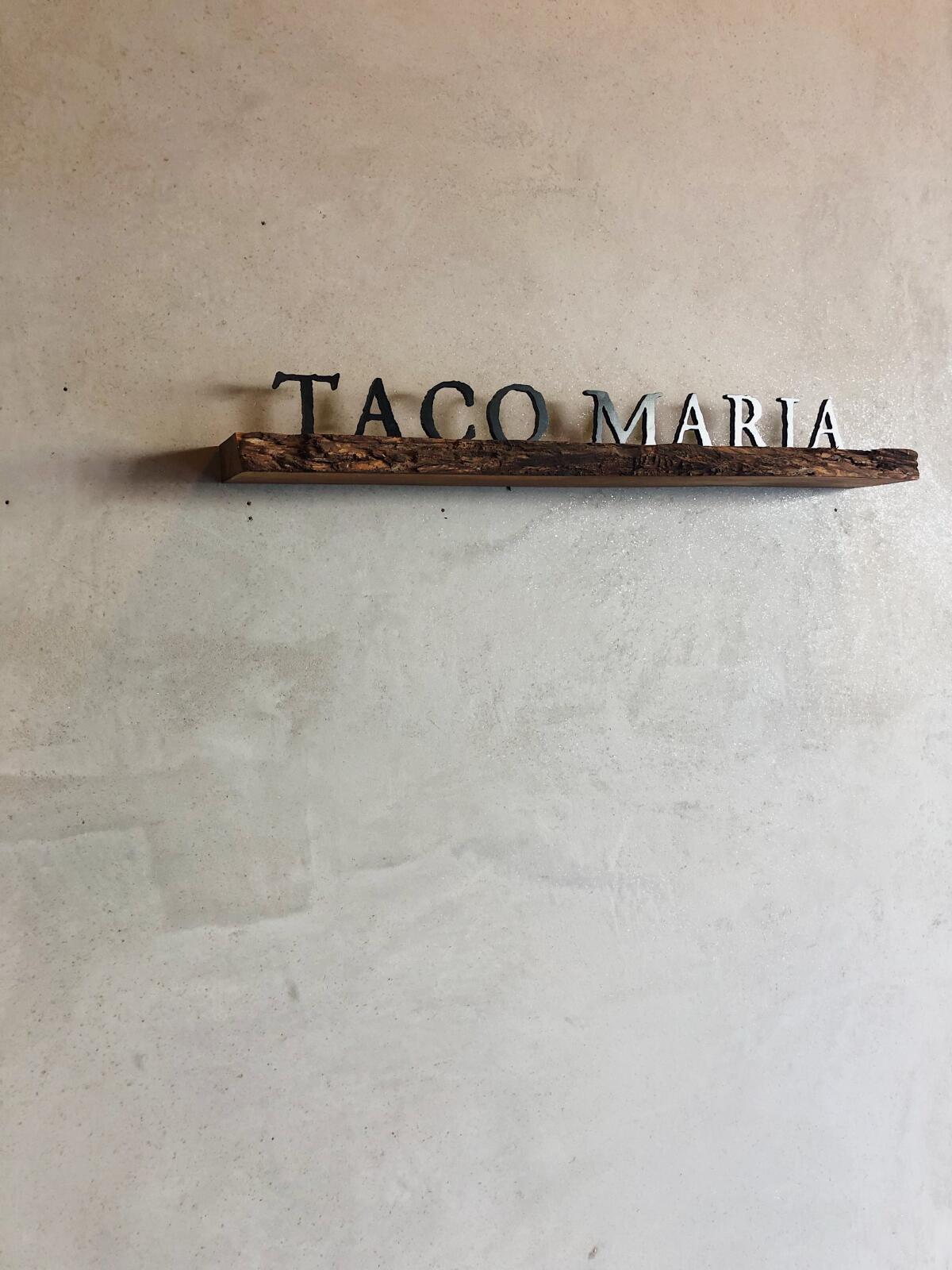 Sign for Taco María, one of the three Michelin-starred restaurants in Orange County.