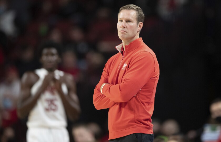 Nebraska coach Fred Hoiberg watches from the sideline as the team plays against Michigan during the second half of an NCAA college basketball game Dec. 7, 2021, in Lincoln, Neb. Hoiberg, in his third season, is 20-54 overall, 5-38 in the Big Ten and 1-27 in road games. His .270 winning percentage is the lowest through any Nebraska coach's first 74 games. The Huskers have lost 19 straight against ranked opponents under Hoiberg and a program-record 20 overall. (AP Photo/Rebecca S. Gratz)