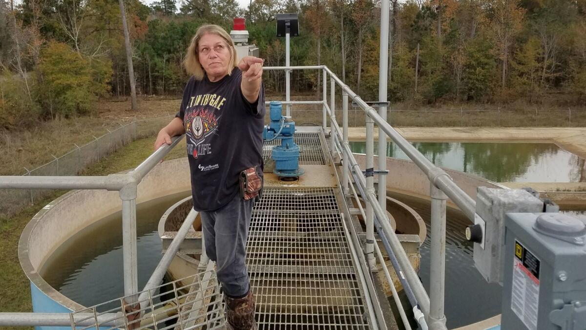 Janice Ratcliff took samples Thursday from the water supply in Rose City, Texas. Residents have had to boil water since Hurricane Harvey hit in August.