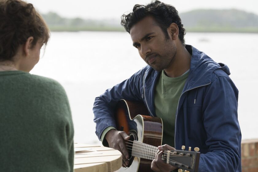 ***EXCLUSIVE****SUMMER SNEAKS 2019**DO NOT USE PRIOR TO APRIL 28, 2019***Jack Malik (Himesh Patel) and his devoted friend Ellie (Lily James) in "Yesterday," directed by Danny Boyle. Writer: Photo credit: Jonathan Prime/Universal Pictures
