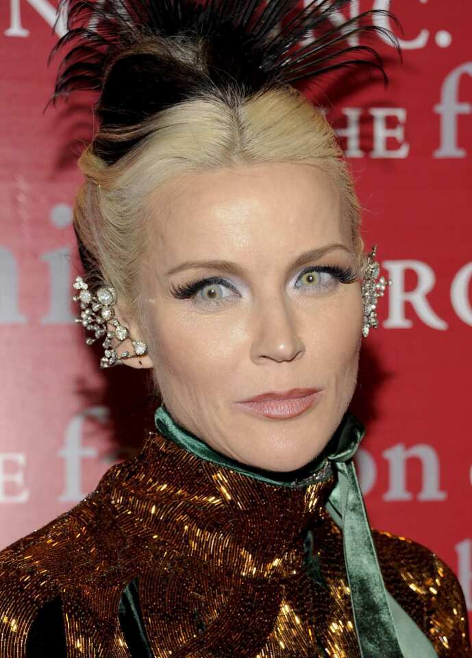 In New York, artist and fashion maven Daphne Guinness turned the act of getting dressed into performance art - dressing for the Met's Costume Institute Gala in the window at Barney's New York Madison Avenue flagship. Later, she was the subject of a show at the Fashion Institute of Technology.