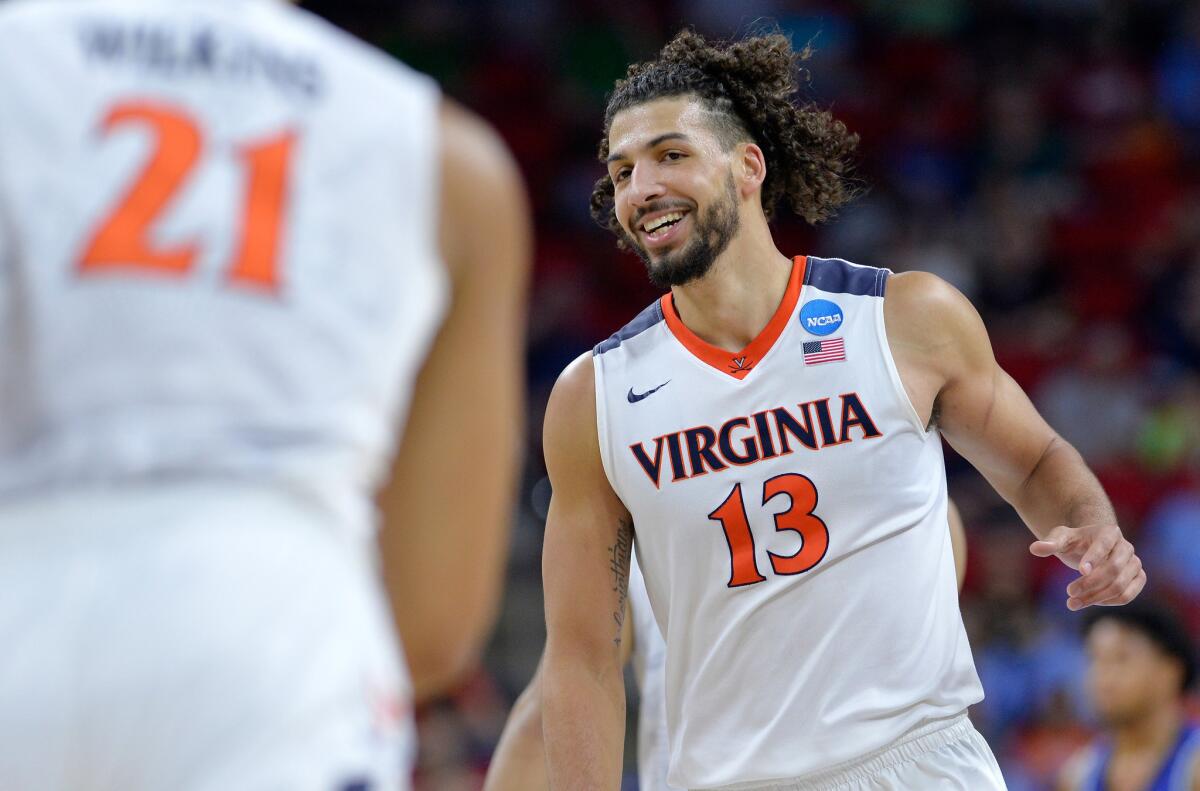 Virginia forward Anthony Gill had 19 points with seven rebounds in the Cavaliers' victory over Hampton, 81-45, in the first round of the NCAA tournament on March 17.
