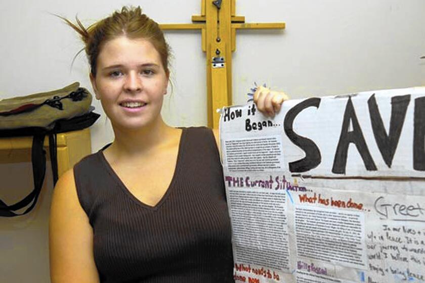 Kayla Mueller, pictured in 2013, frequently volunteered to help women and children.