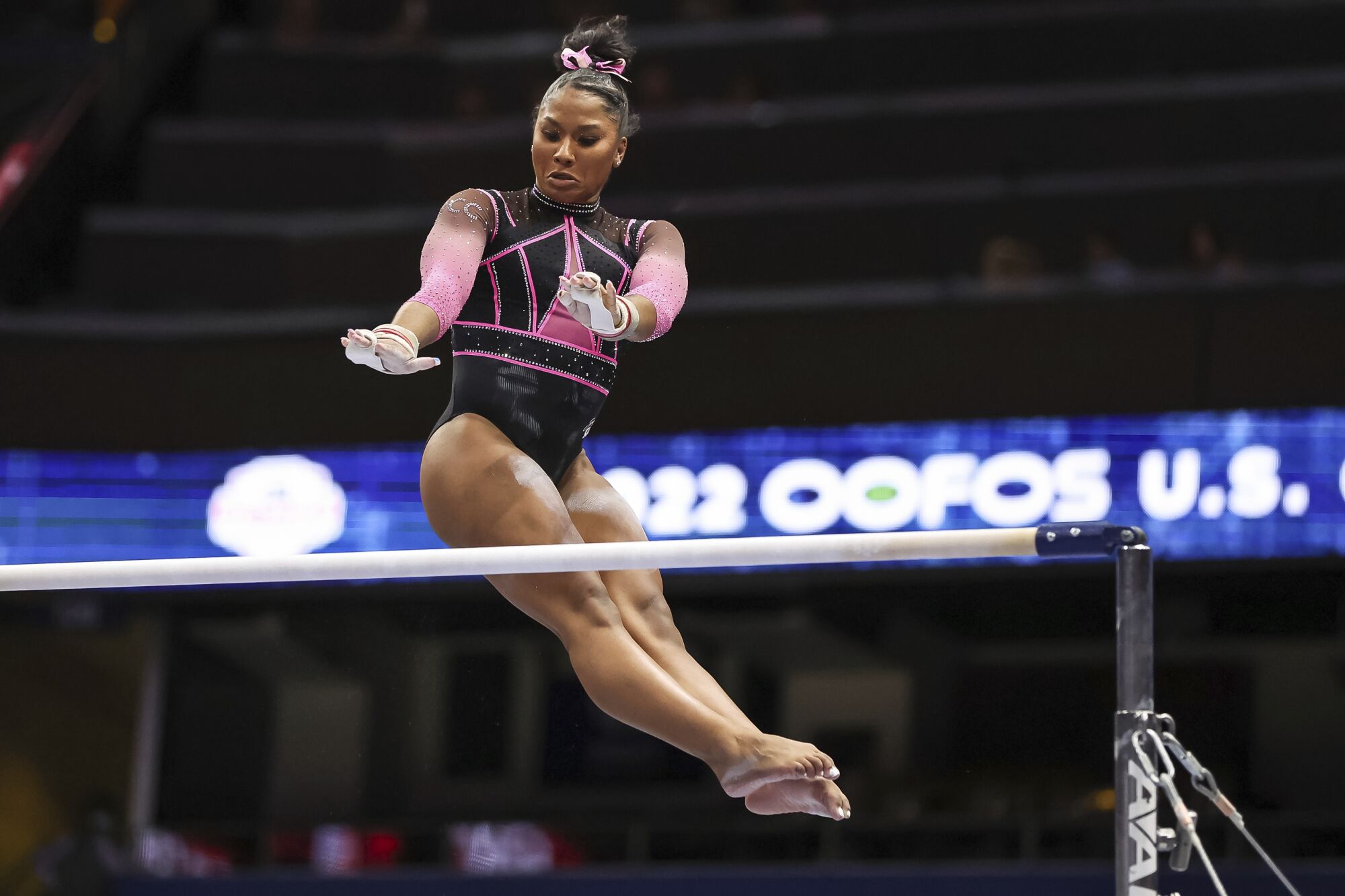 Jordan Chiles competes on the uneven bars at the US Gymnastics Championships in August.