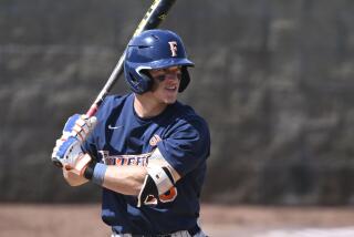 Cal State Fullerton's Cole Urman plays during an NCAA baseball game against UC Irvine on Saturday.