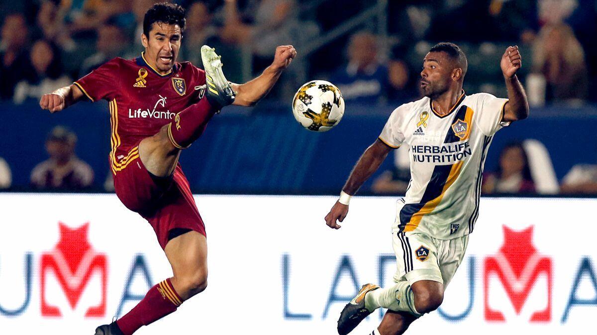 Ashley Cole, right, has played the left back position against opponents like Tony Beltran and Real Salt Lake with a great deal of skill and efficiency since joining the Galaxy in MLS.