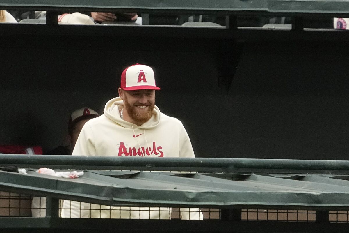 Angels pitcher Sam Bachman smiles in the bullpen during the first inning Friday.