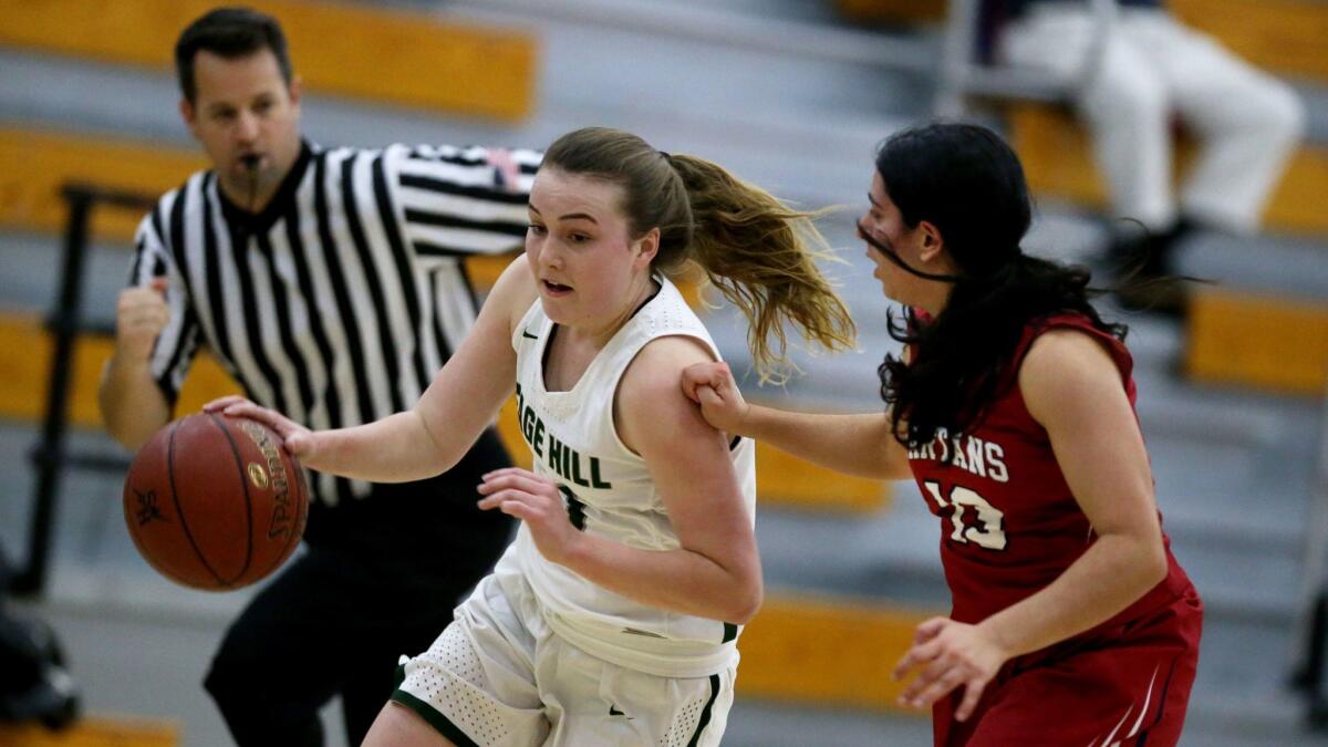 Sage Hill's Kate Knollenberg (11) drives to the basket in an Academy League game against St. Margaret's on Friday.