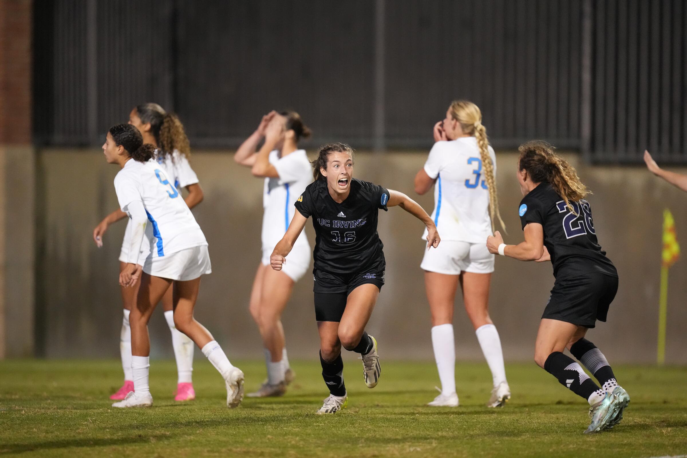UC Irvine's Alyssa Moore celebrates after scoring against UCLA in a 1-0 NCAA tournament playoff victory over the Bruins.