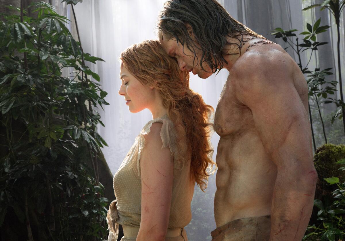 Margot Robbie, izquierda, y Alexander Skarsgard en una escena de "The Legend of Tarzan".