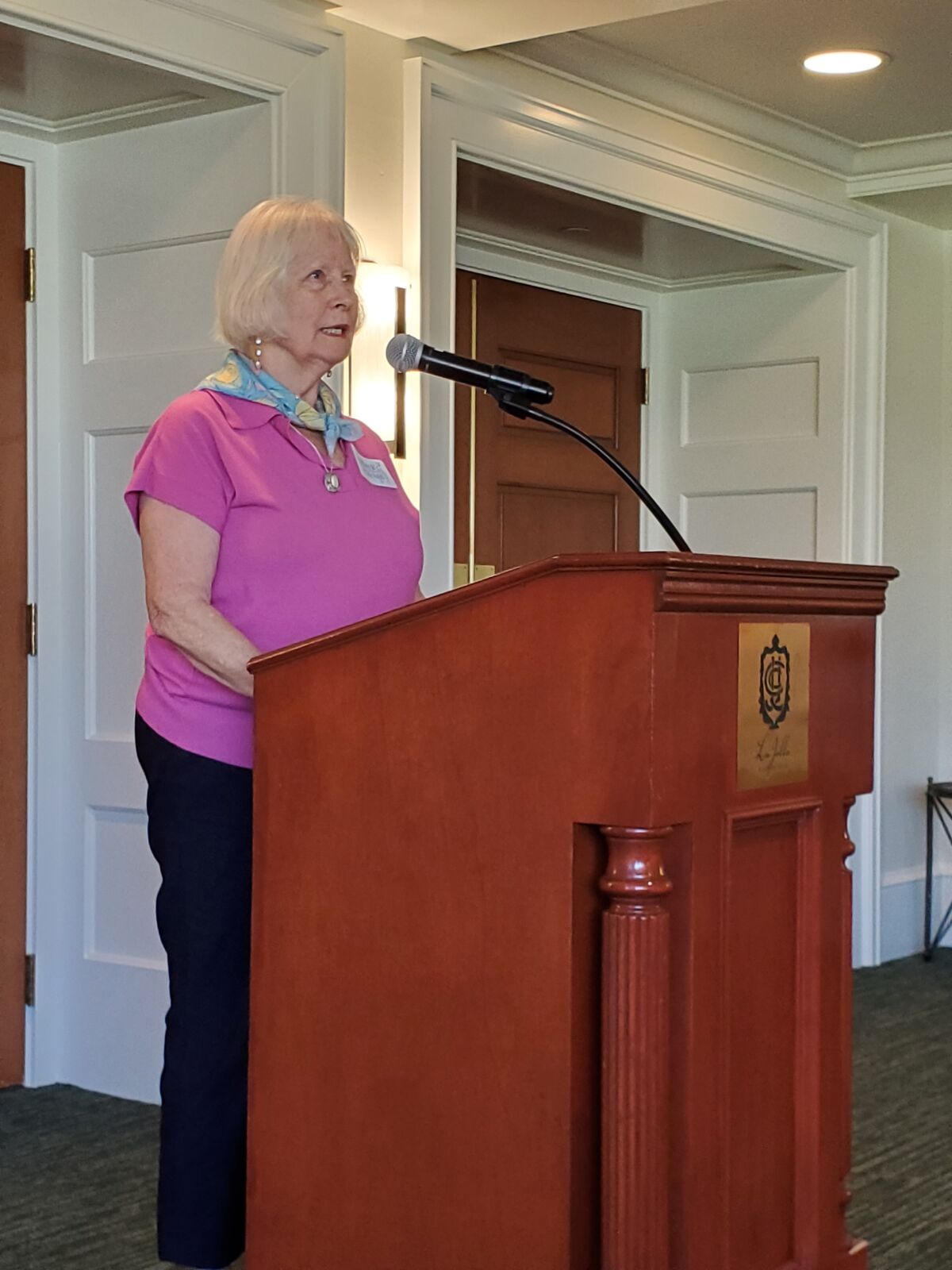 Mary Mitchell addresses the La Jolla Garden Club during its scholarship luncheon May 17 at the La Jolla Country Club.