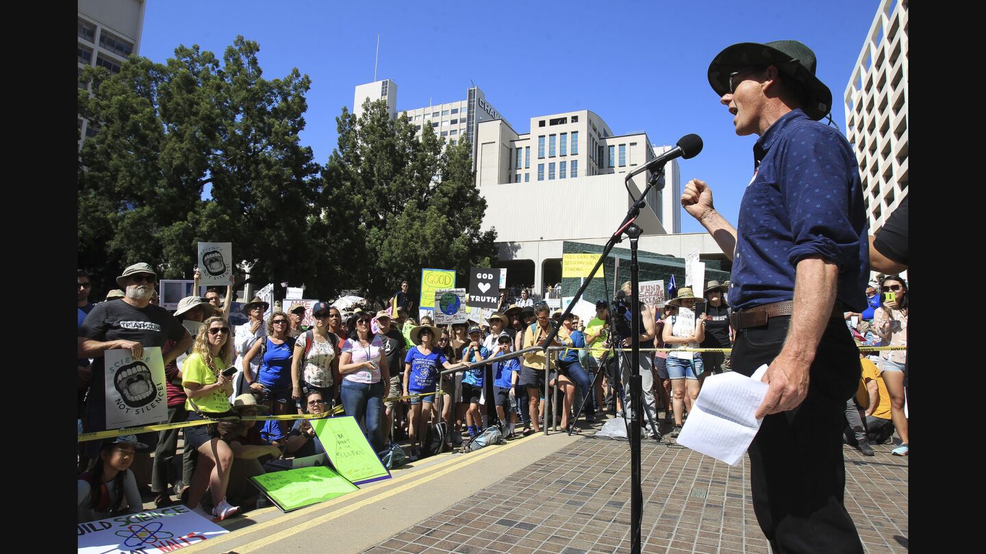 Climate scientist Ralph Keeling, a professor at Scripps Institute of Oceanography, speaks to the crowd during the March for Science rally at the Civic Center Plaza.