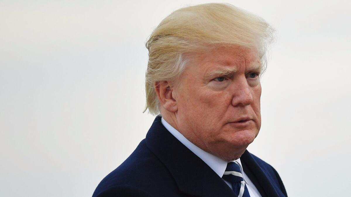 President Trump makes his way to board Air Force One on Dec. 2, 2017.