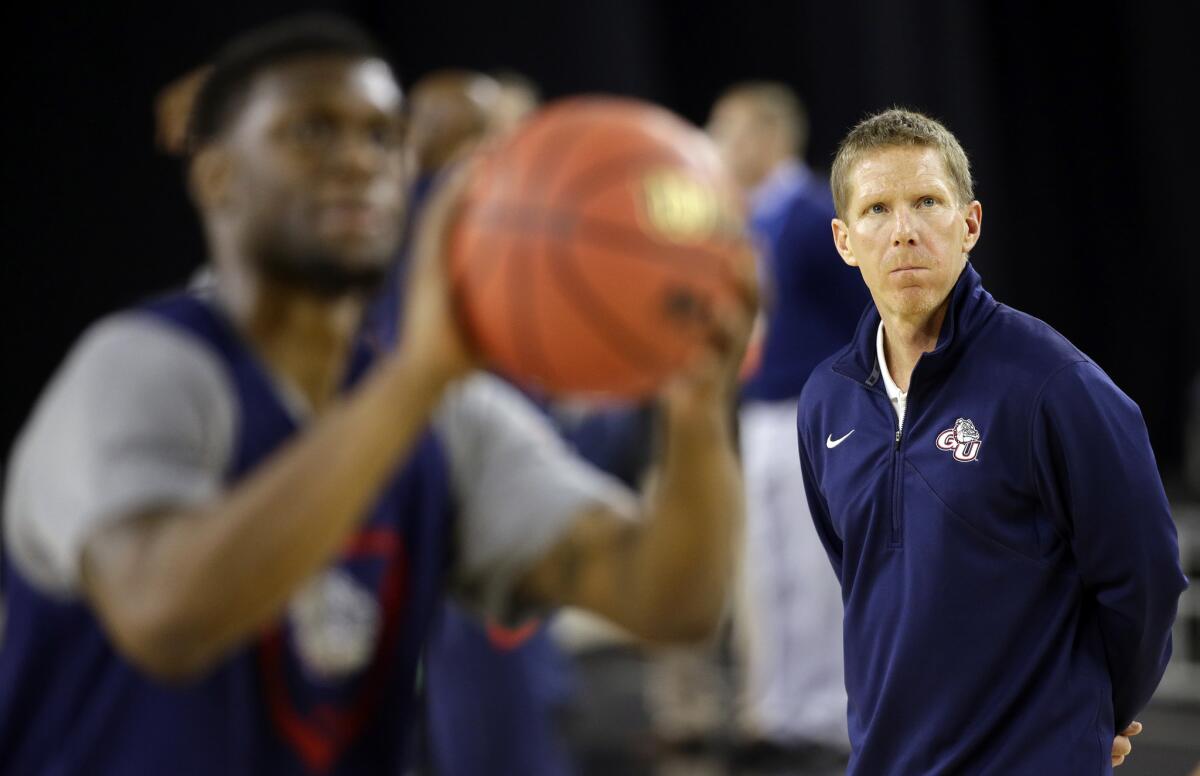 Gonzaga Coach Mark Few watches his team during a practice session earlier this week before the Bulldogs' Sweet 16 matchup Friday with the UCLA Bruins.