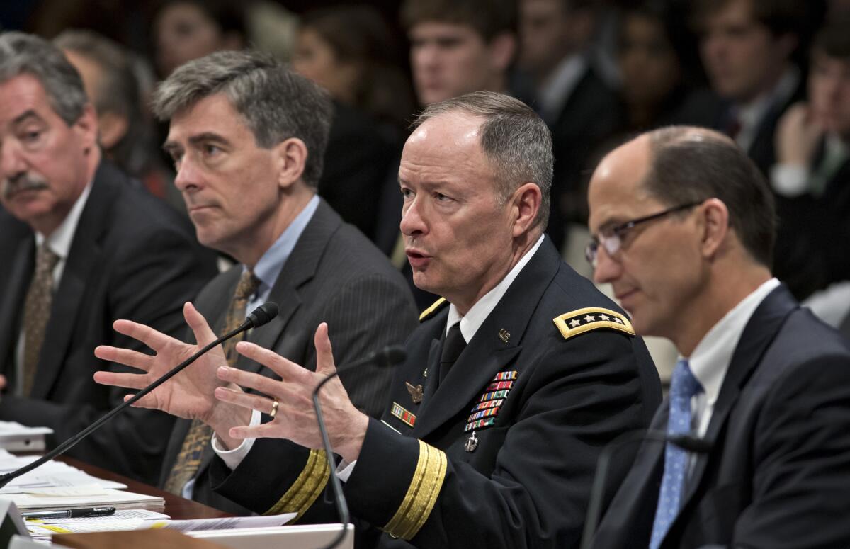 Congress and the public are asking questions about how the war on terrorism is affecting Americans' privacy - and the government is beginning to provide answers. Above: NSA Director Gen. Keith B. Alexander, second from right, testifies on Capitol Hill before the House Intelligence Committee about revelations that the electronic surveillance agency is sweeping up Americans' phone and Internet records in its quest to investigate terrorist threats.
