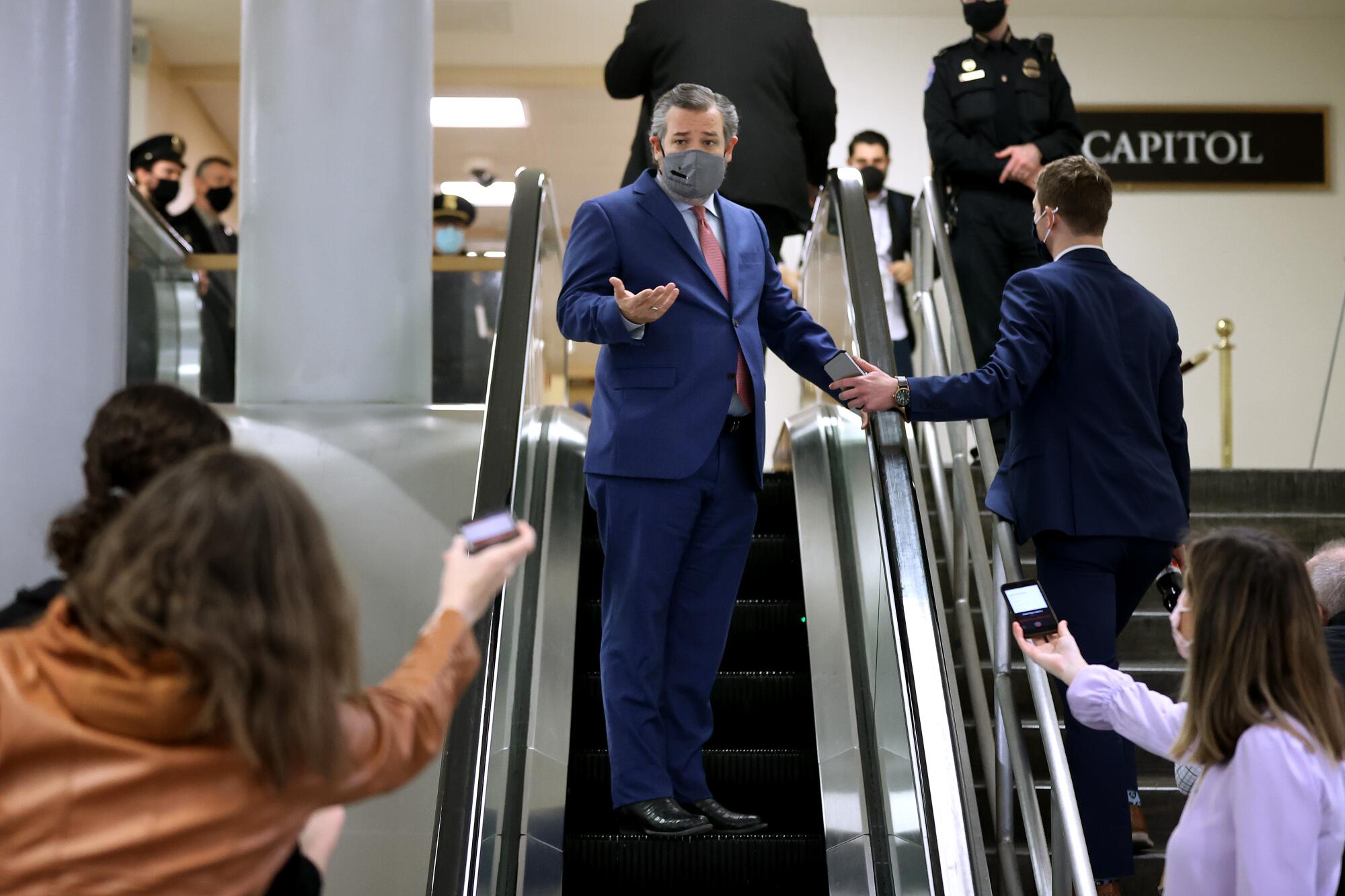 Ted Cruz on an escalator