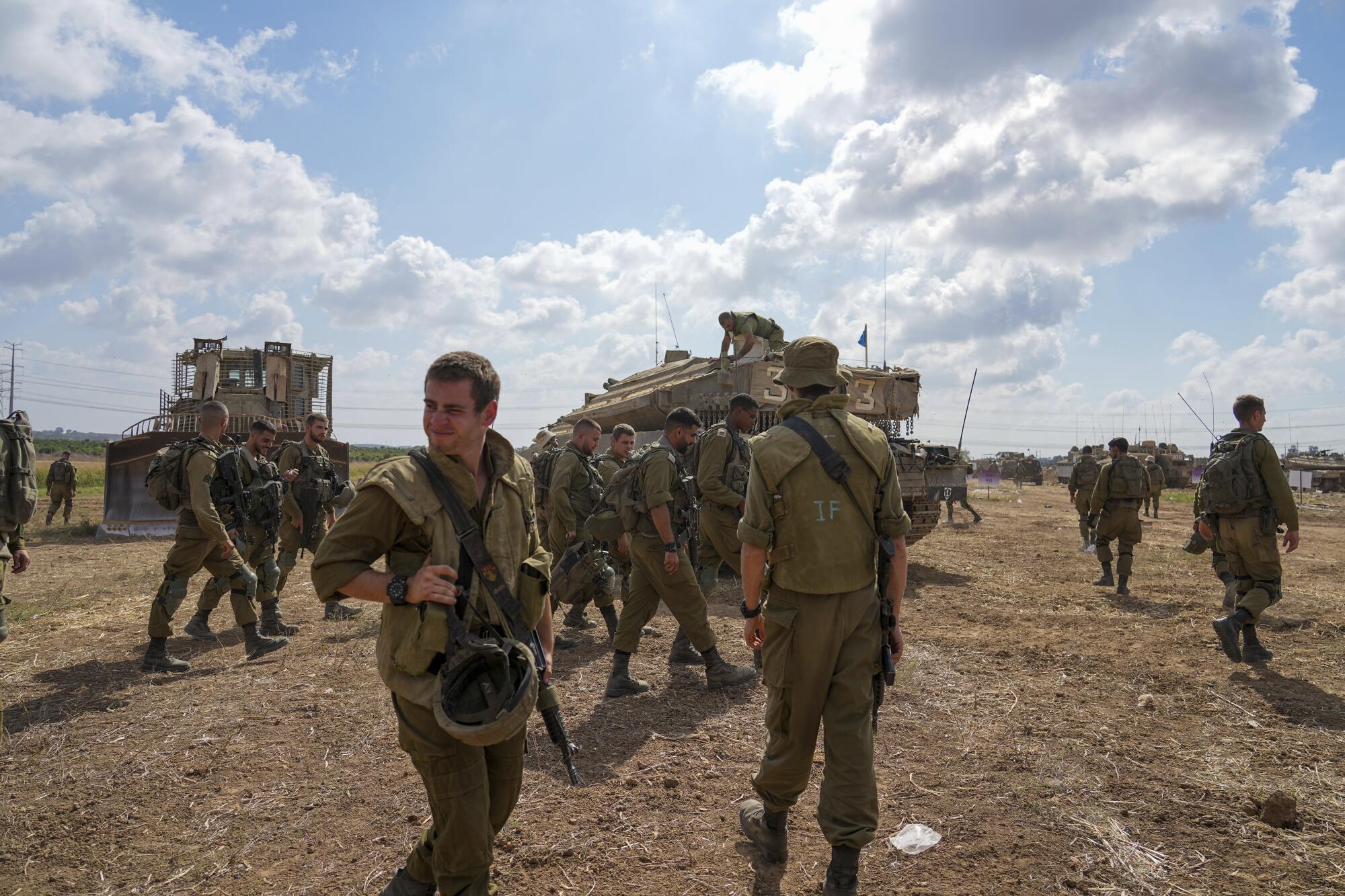 Israeli soldiers at a staging area near the border with Gaza Strip