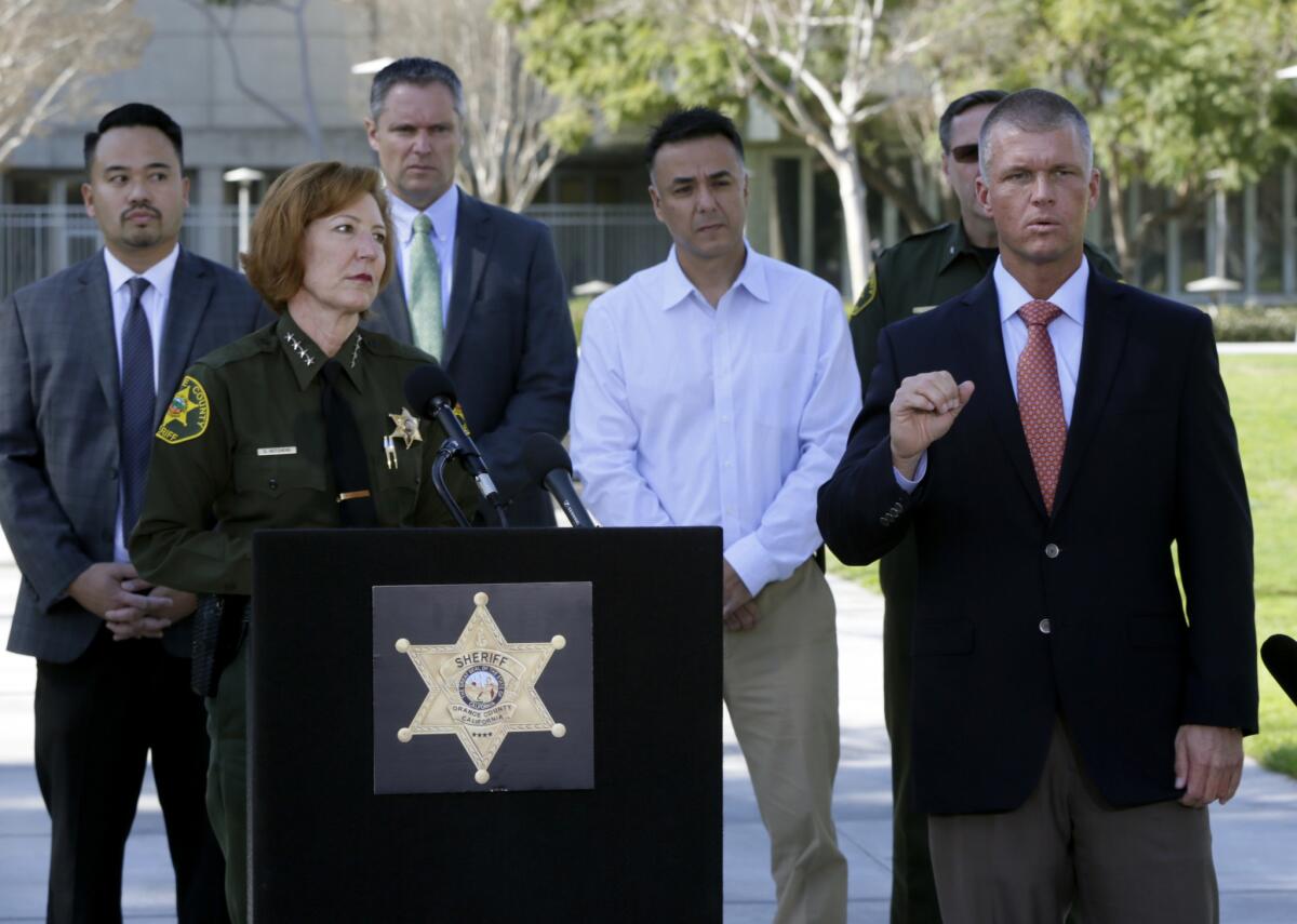 Orange County Sheriff Sandra Hutchens, left, at a news conference Jan. 29 in Santa Ana, said the escape of three jail inmates was an embarrassment for her department.