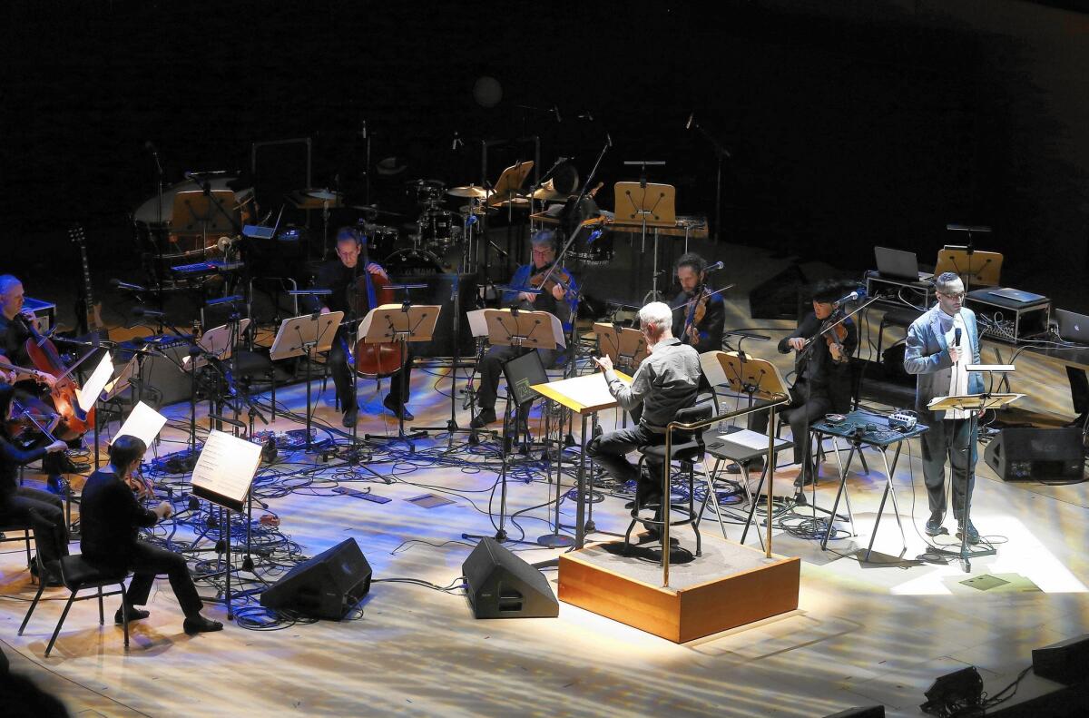 Cedric Berry, right, performx excerpts from "I Was Looking at the Ceiling and Then I Saw the Sky" at the Walt Disney Concert Hall.