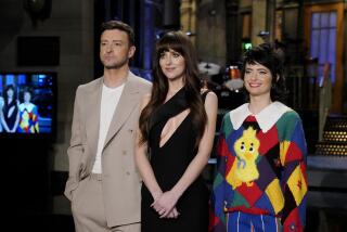SATURDAY NIGHT LIVE -- Episode 1854 -- Pictured: (l-r) Musical guest Justin Timberlake, host Dakota Johnson, and Sarah Sherman during Promos in Studio 8H on Thursday, January 25, 2023 -- (Photo by: Rosalind O'Connor/NBC)