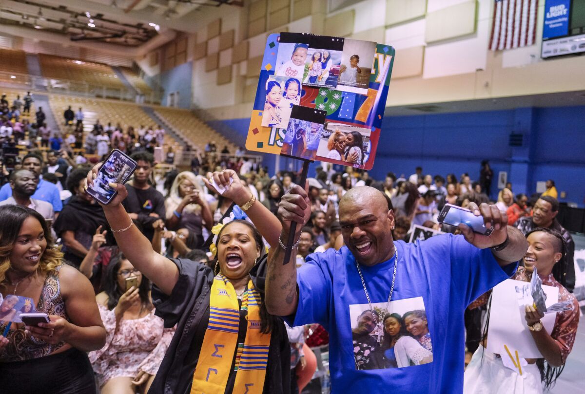 Relatives and friends show their support during the Black Graduation ceremony at UC Riverside.