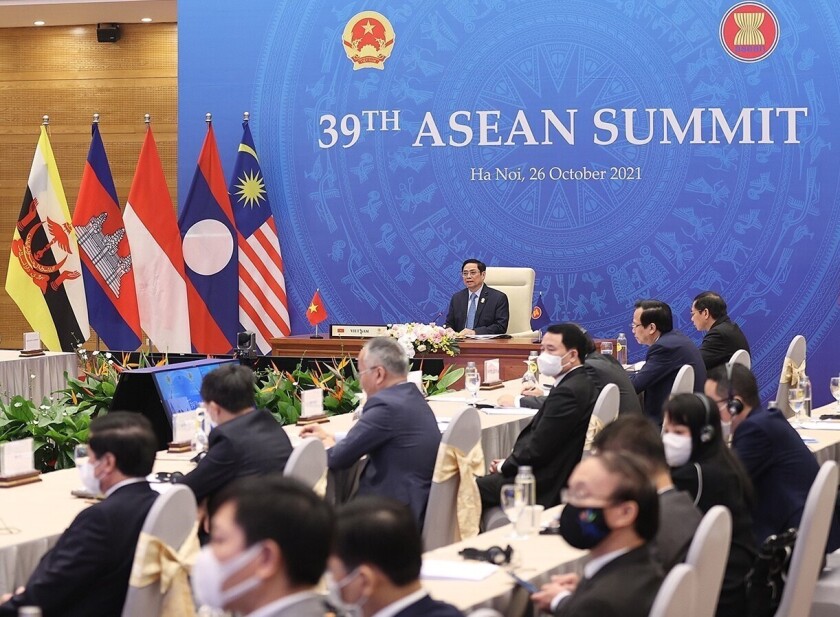 Vietnamese Prime Minister Pham Minh Chinh, rear, speaks during the ASEAN summit, which was held virtually, on Tuesday.