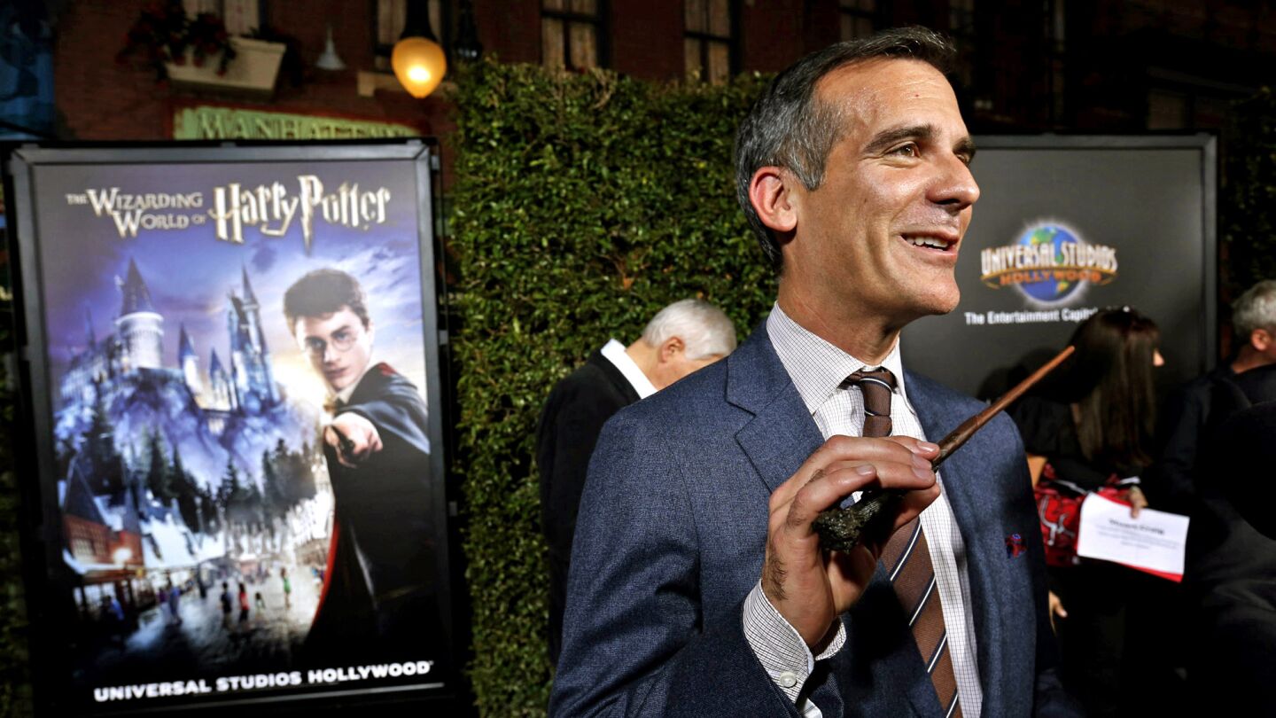 Los Angeles Mayor Eric Garcetti with a special wand for the debut of the Wizarding World of Harry Potter at Universal Studios Hollywood.