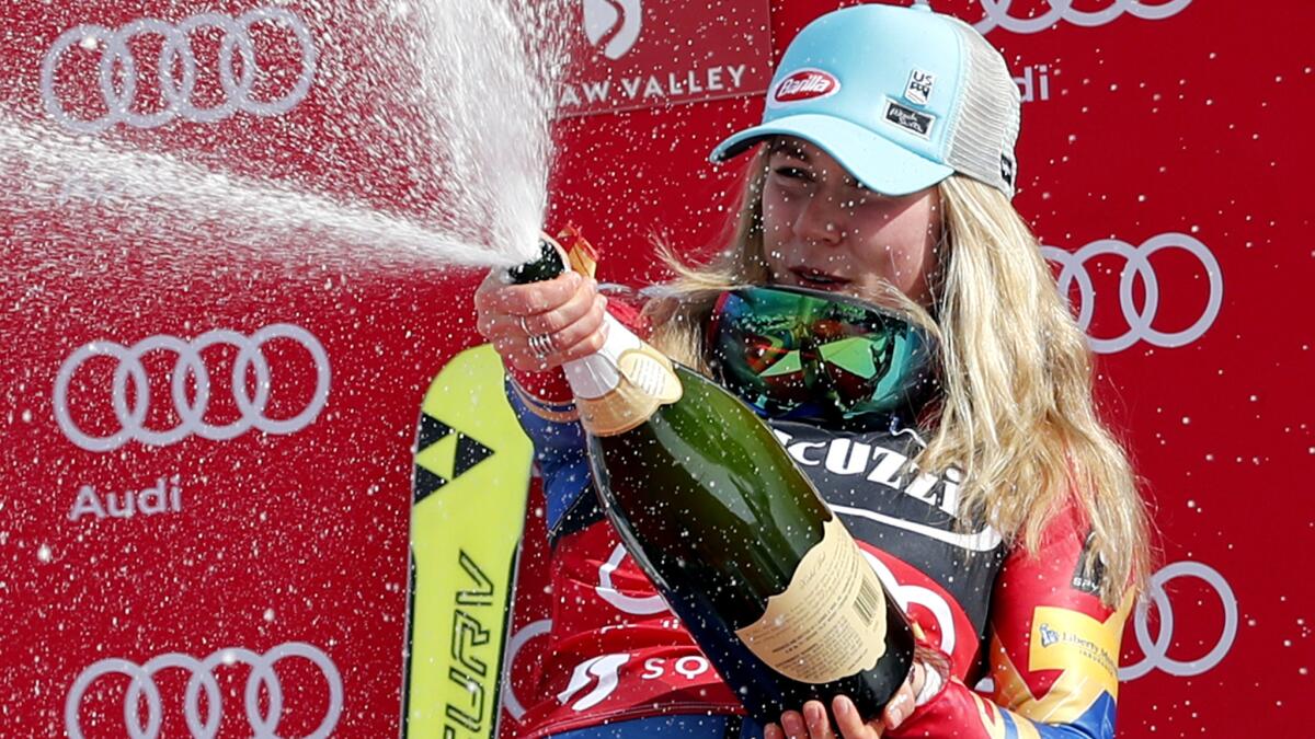 Mikaela Shiffrin celebrates after winning the slalom event at the World Cup event at Squaw Valley on March 11, 2017.