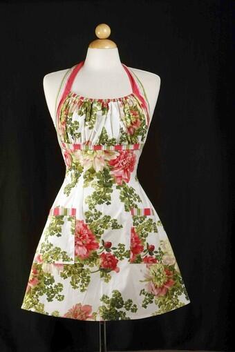 This apron, named Tea Party, is part of the Heavenly Hostess line of upscale aprons and kitchen linens created by Wadell.