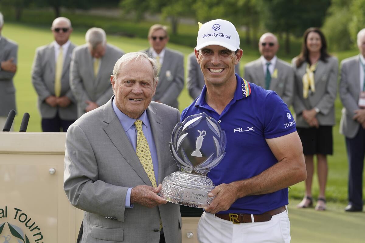 Billy Horschel, right, poses with Jack Nicklaus after winning the Memorial golf tournament Sunday, June 5, 2022, in Dublin, Ohio. (AP Photo/Darron Cummings)