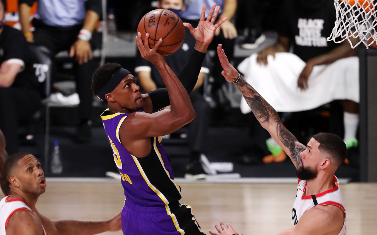 Lakers guard Rajon Rondo shoots during Friday's Game 1 playoff loss to the Houston Rockets.