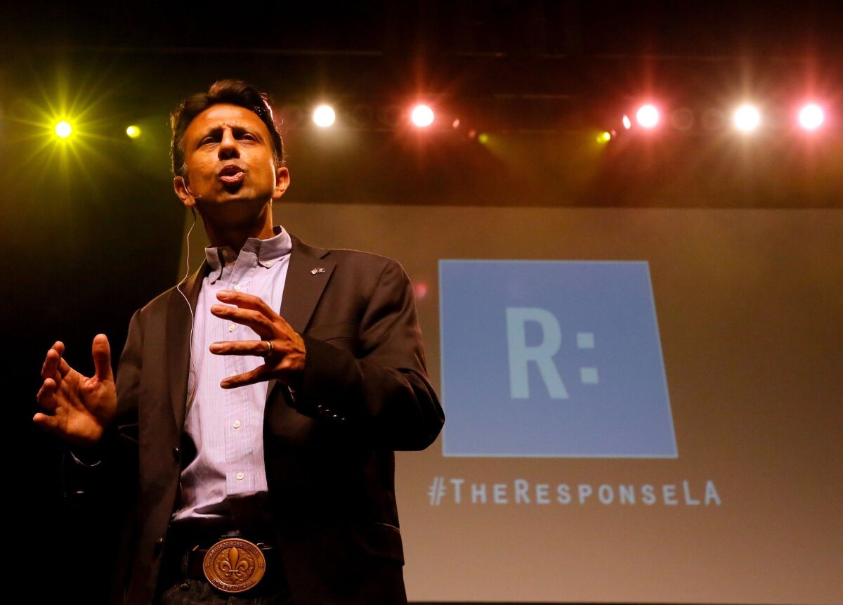 Louisiana Gov. Bobby Jindal speaks during a prayer rally in Baton Rouge last month. Did the prayer agenda include asking divine help to keep a local ER open?