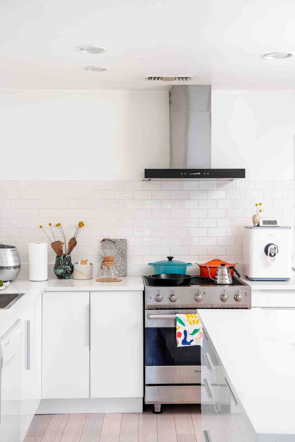 Ted Vadakan and Angie Myung's kitchen in Mt. Washington features inexpensive Ikea cabinets.