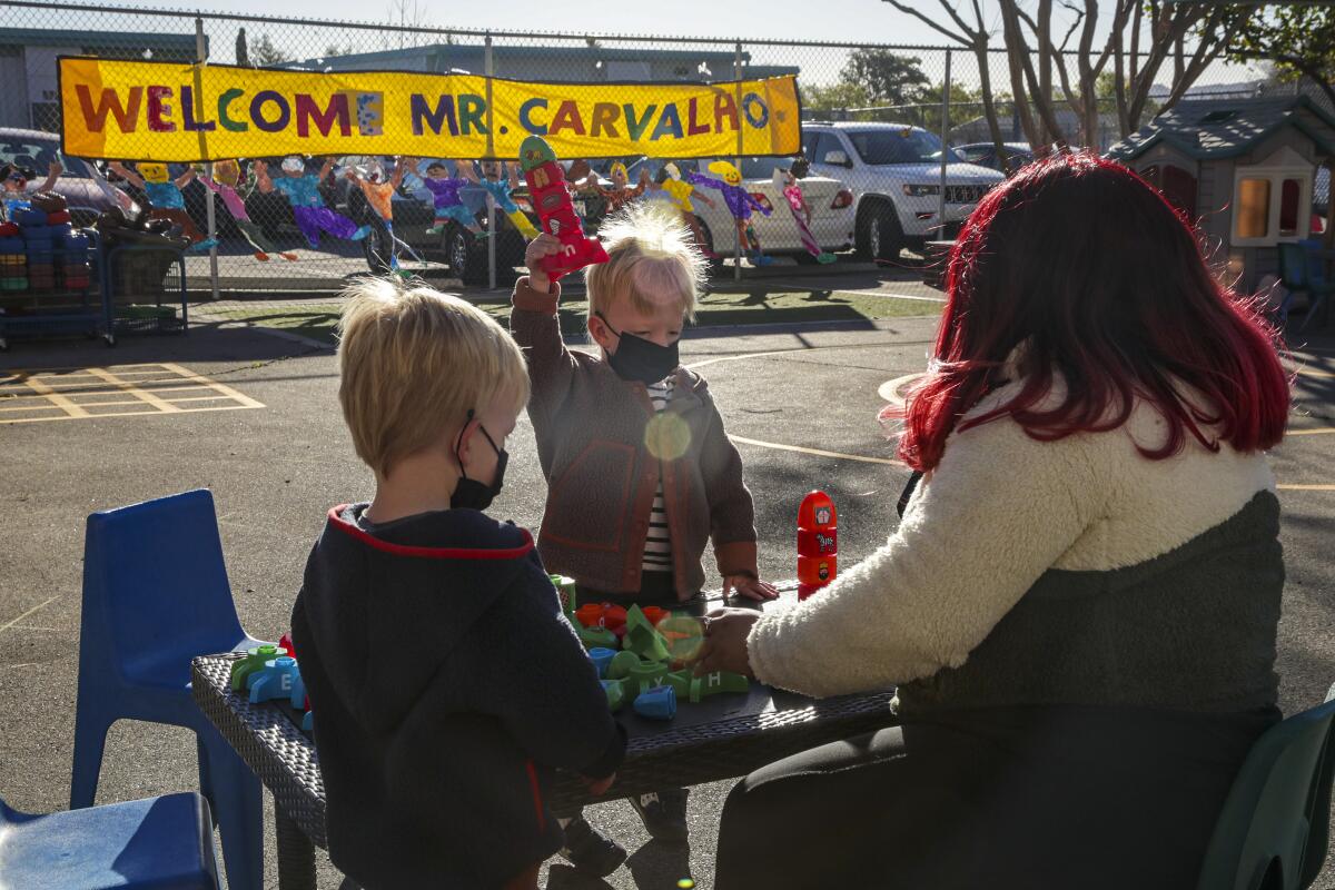 Students play outdoors at Fair Avenue Early Education Center