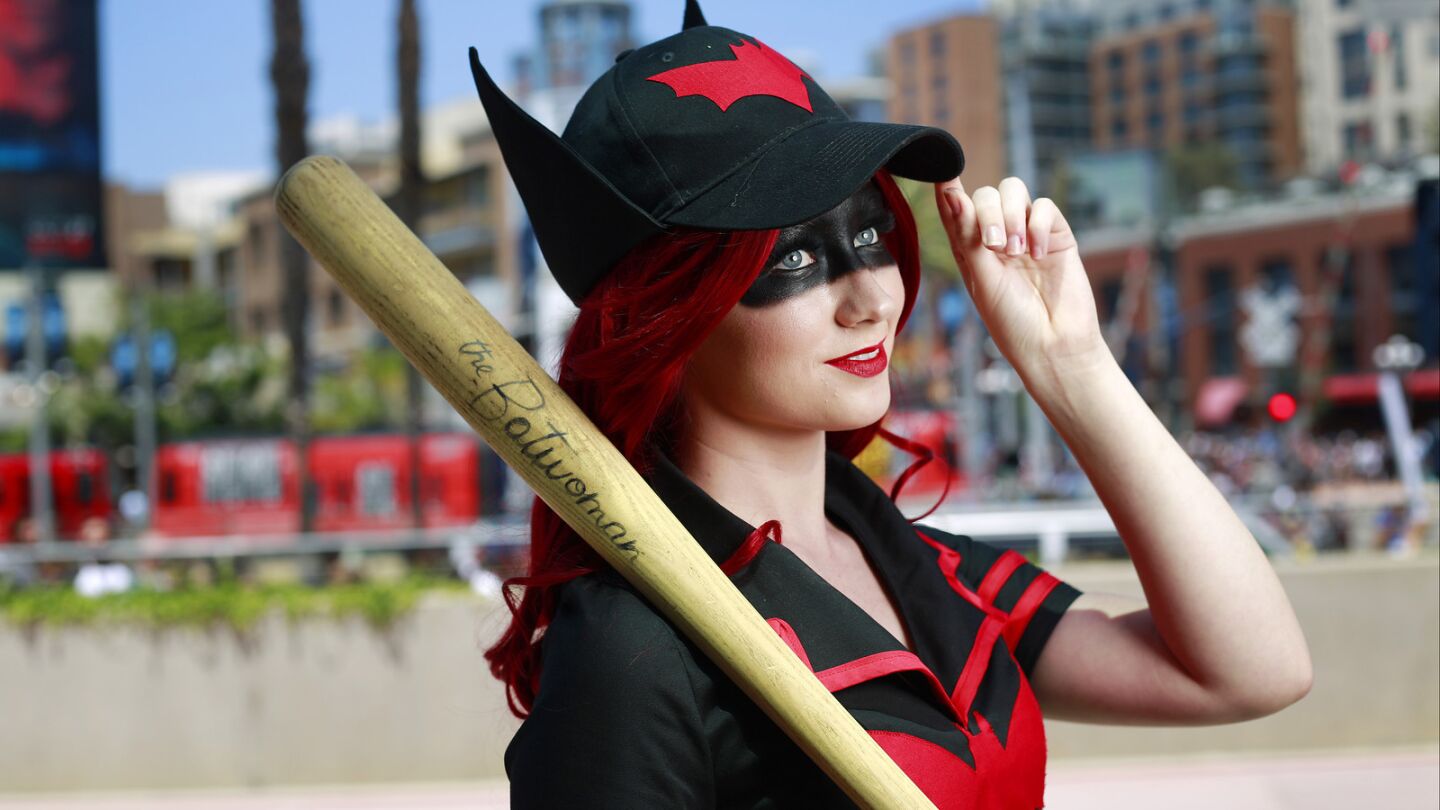 Emma Skies of San Diego dresses as Bombshell Batwoman on Saturday for her hometown Comic-Con.