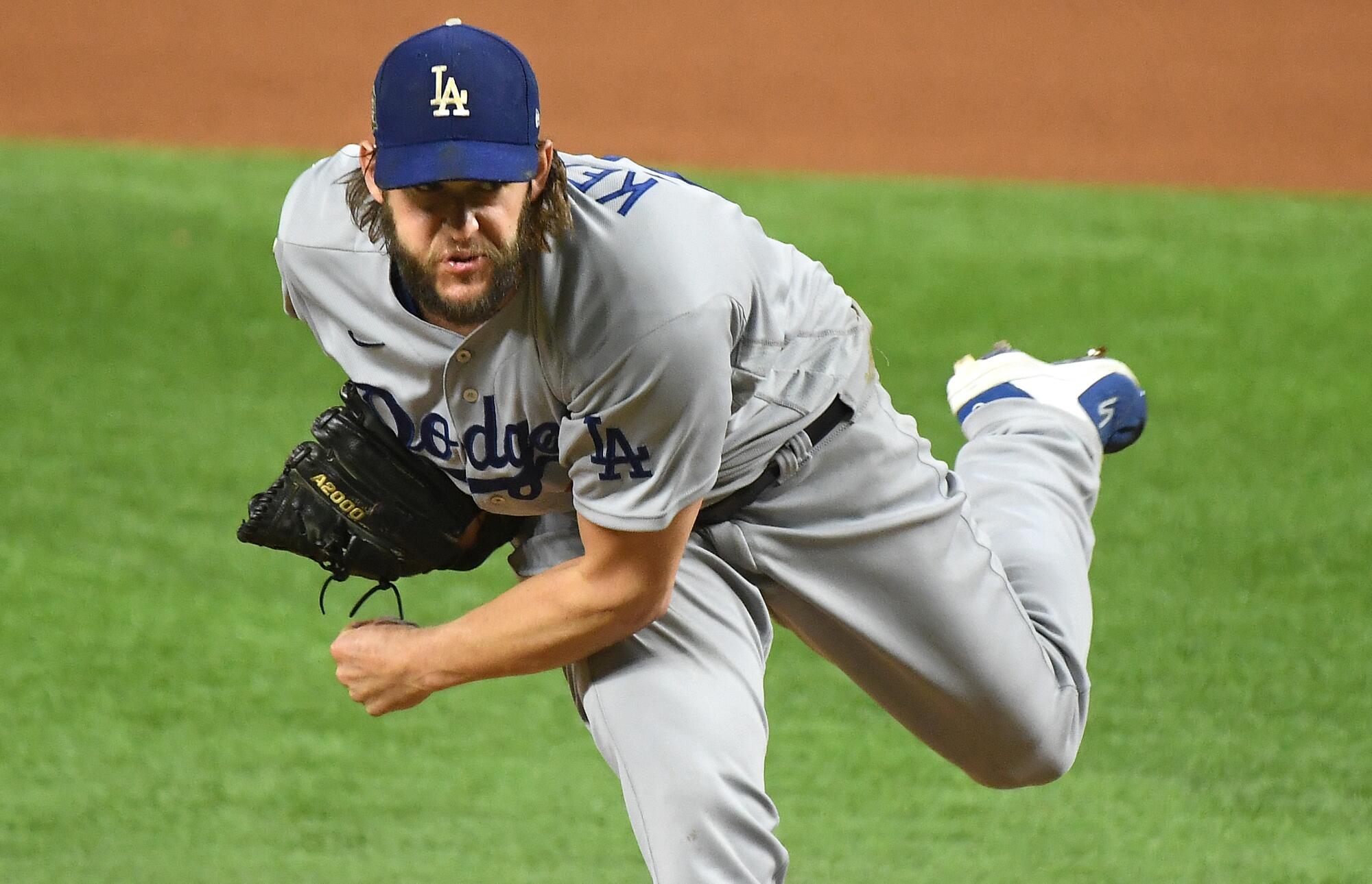 Clayton Kershaw throws a pitch against the Rays during Game 5 of the World Series.