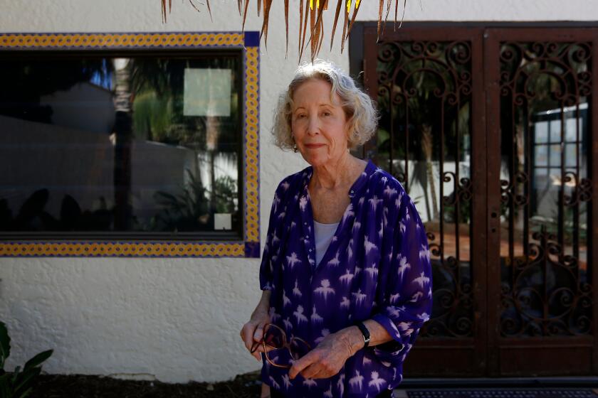Beverly Grove homeowner Rochelle D. Ventura, in front of her backyard art studio. Ventura tried to get approval to get a secondary unit several years ago, but was denied by the city.