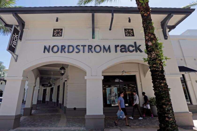 This Tuesday, Aug. 29, 2017, photo, shows a Nordstrom Rack store in Miami. Nordstrom says itâs temporarily halting an exploration into taking the company private. The retailer said that a group that includes several members of the Nordstrom family plans to resume looking into a possible deal after the holiday season ends. (AP Photo/Alan Diaz)