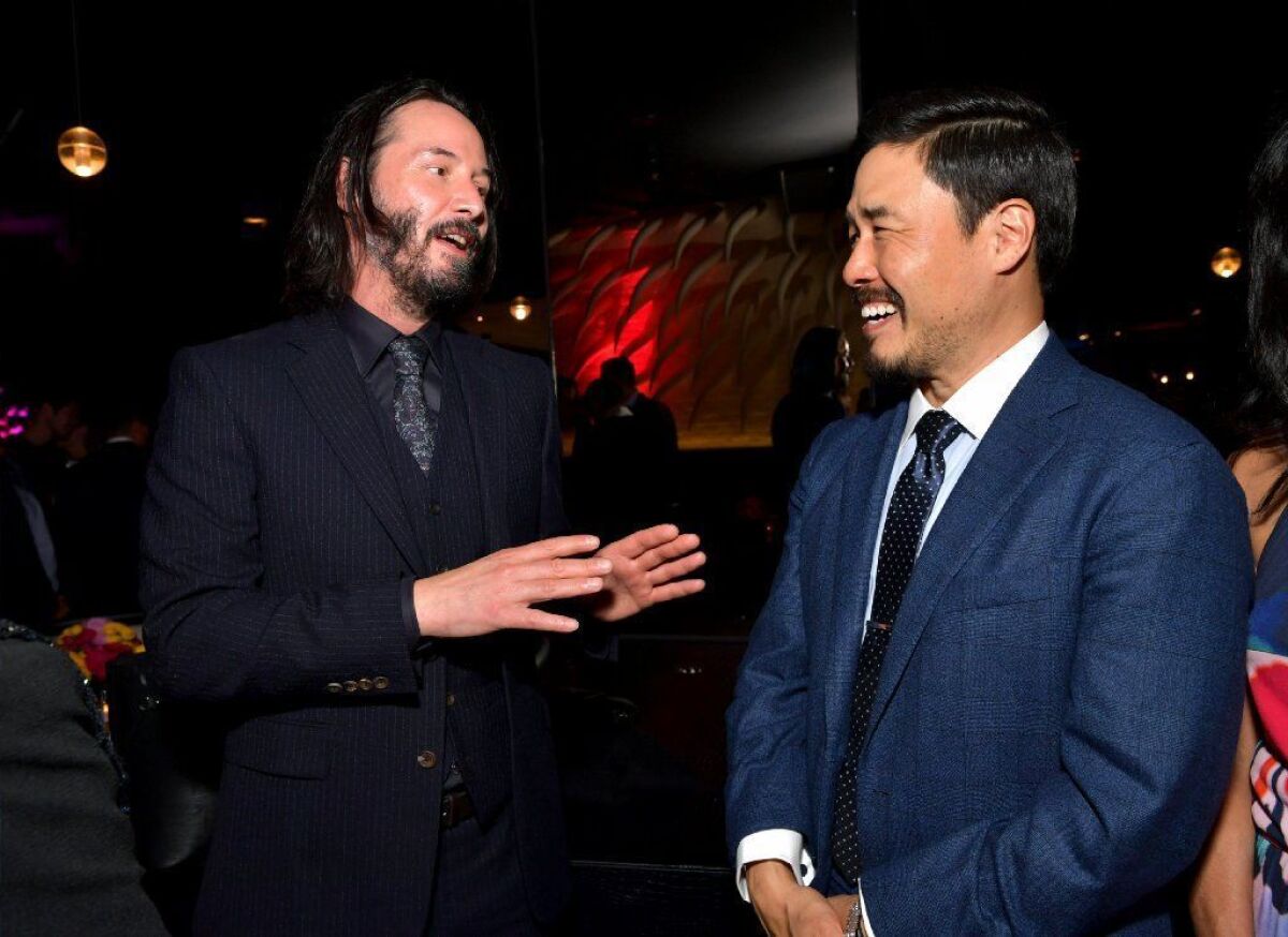 Keanu Reeves, left, and Randall Park attend the after-party for the world premiere of Netflix's 'Always Be My Maybe' on May 22, 2019, in Westwood.