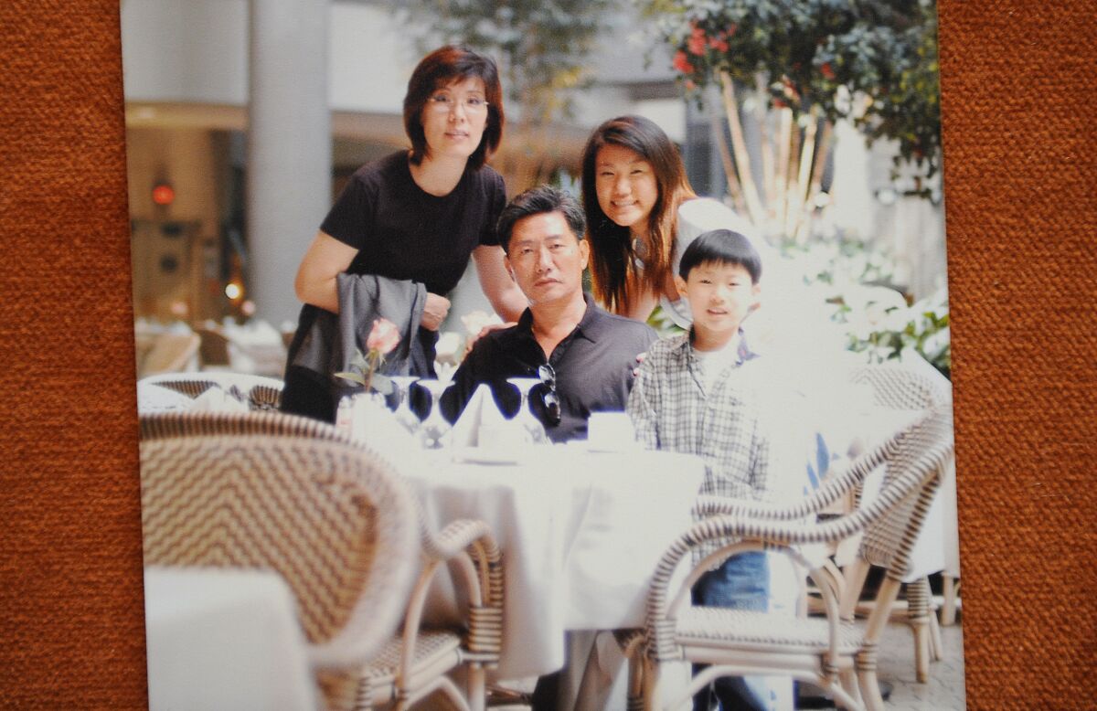 Binna Kim, second from right, in a photograph with her parents and her younger brother.