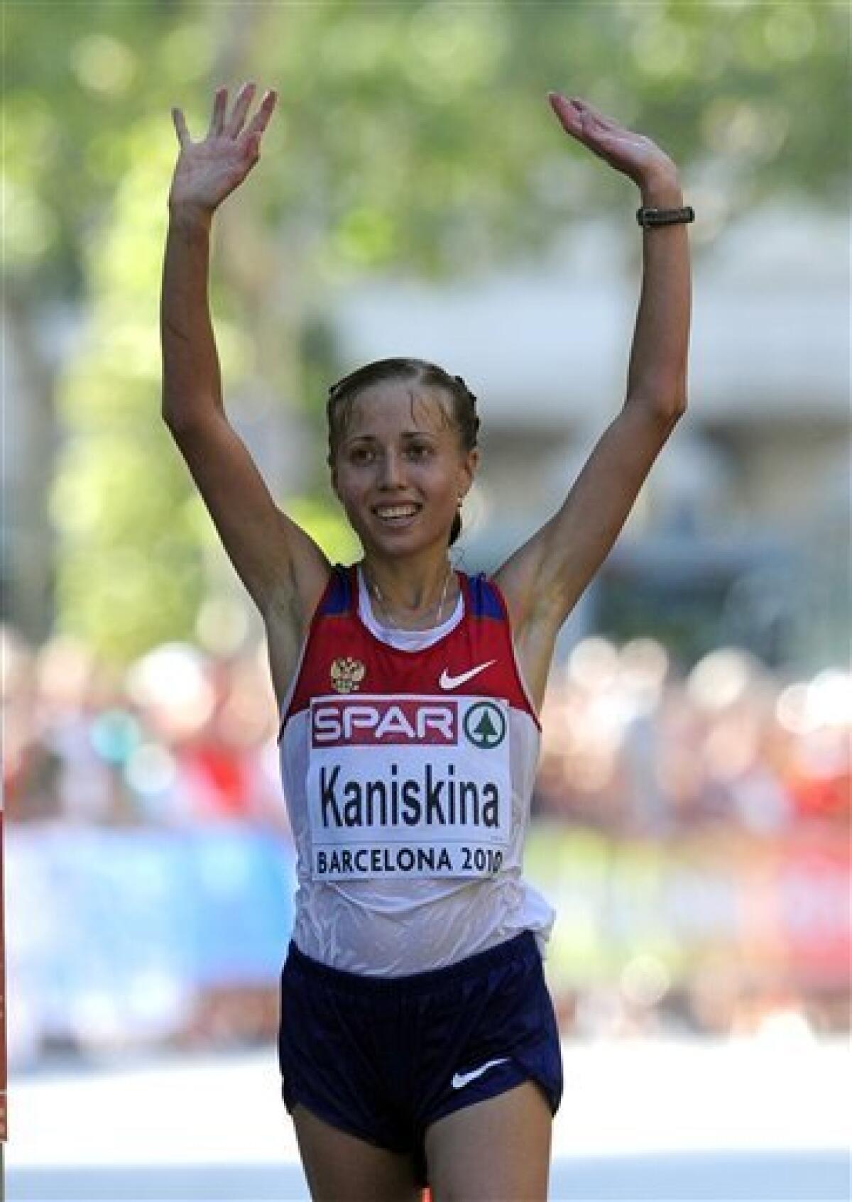 Russia's Olga Kaniskina reacts after winning the Women's 20km Race Walk during the European Athletics Championships, in Barcelona, Spain, Wednesday, July 28, 2010. (AP Photo/Manu Fernandez)